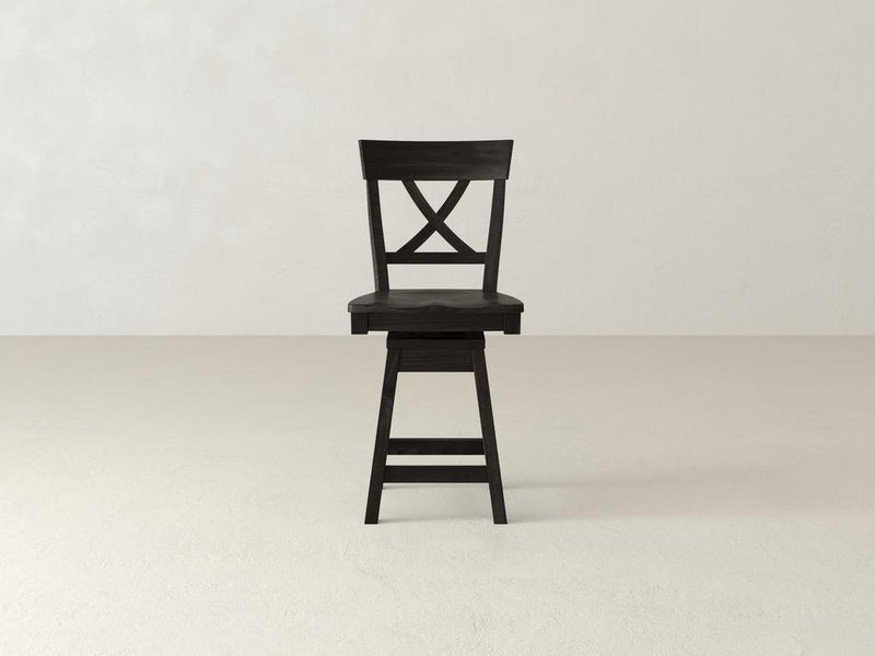 The James & James Juniper Swivel Stool, crafted from dark maple hardwood, features a tall backrest with an elegant X-back design. It showcases style and functionality with its swivel base and four sturdy legs against a plain white backdrop.
