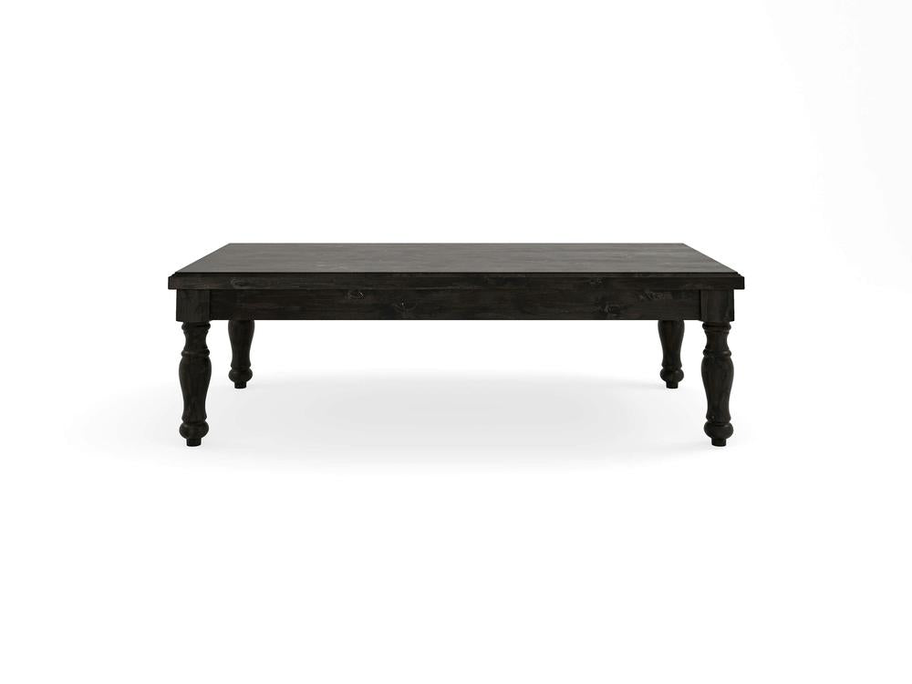 The Abigail Coffee Table - Charred Ember by James+James features a dark wooden design with a rectangular top and four slightly ornate, turned legs. Set against a white background, the table exhibits a simple yet classic design, lending it a traditional appearance.