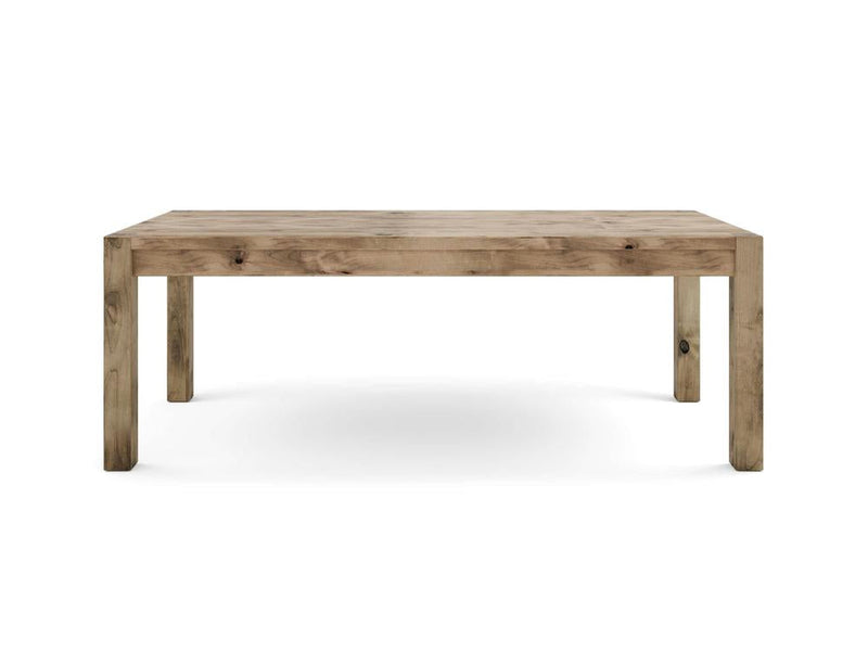 An image of the Jonathan Dining Table - Harvest Wheat by James+James, featuring a rectangular design with a simple, rustic appeal. The table boasts four sturdy legs and a substantial, flat tabletop, all crafted from light-colored wood with visible natural grain patterns.
