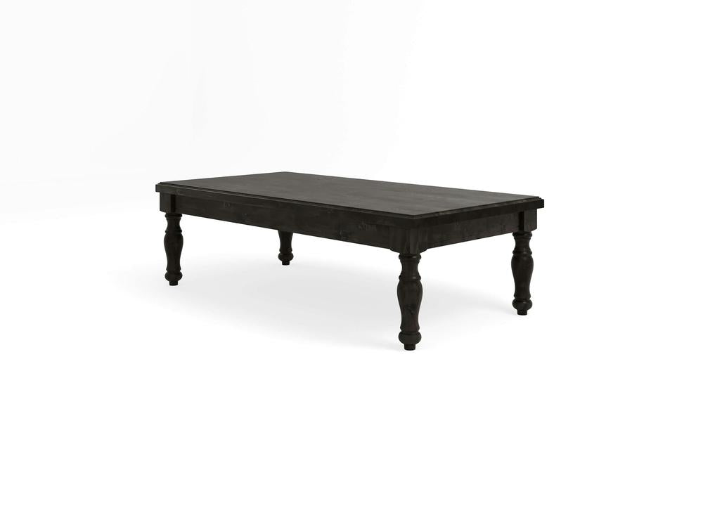 The Abigail Coffee Table in Charred Ember by James+James is an elegant rectangular wooden table featuring a dark finish. It boasts a flat top and intricately carved legs, blending classic and modern design elements to suit various dining or living spaces.