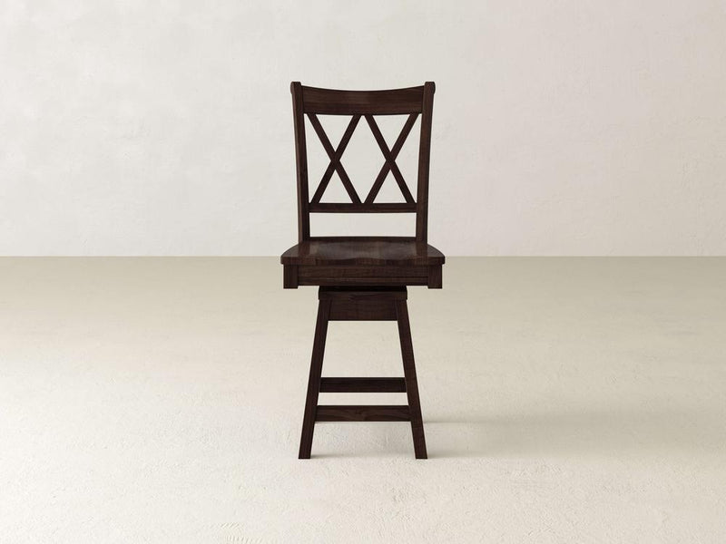 A James & James Double X Back Swivel Stool, featuring an elegant X-pattern on its backrest and a flat seat above four angled legs with a horizontal support, is centered against a plain light-colored background, offering sophisticated and elegant seating with its dark wooden finish.