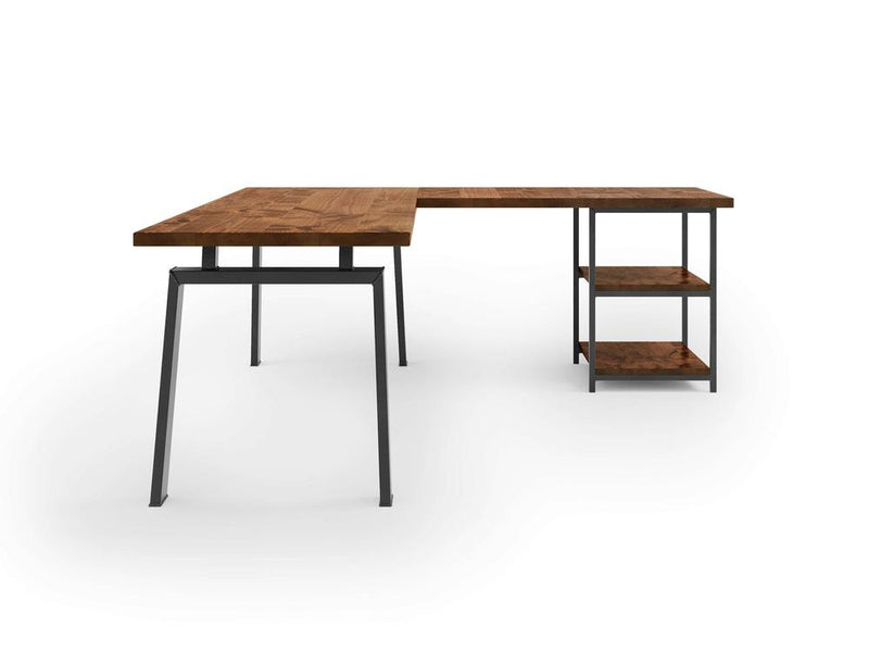 The Fulton Corner Desk - Tuscany by James & James is a modern L-shaped desk with a wooden surface and black metal legs, featuring open shelves for storage against a white backdrop.