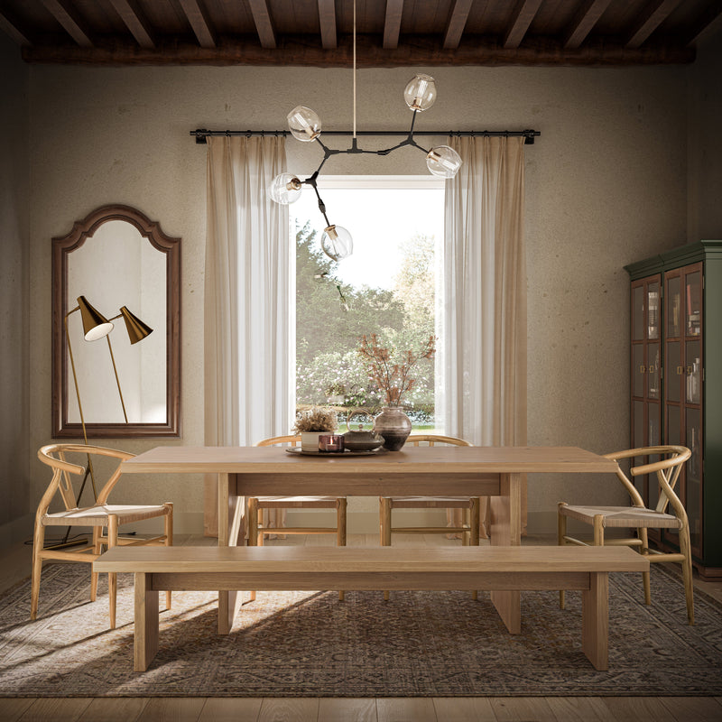 Pictured at 7' L in Satin - No Stain Finish. Pictured with <a href="/products/noelle-white-oak-dining-table">Noelle White Oak Dining Table</a> in Satin - No Stain Finish, <a href="/products/belfast-chair">Belfast Solid Oak and Cane Chairs</a>, and <a href="/products/harriet-area-rug">Harriet Area Rug</a>.